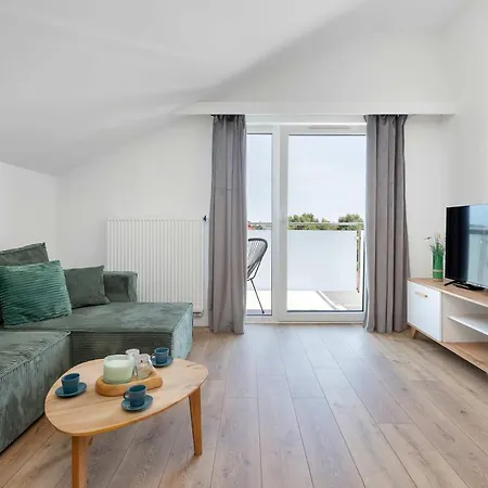 Family With A Balcony And Playground In By Renters Апартаменты