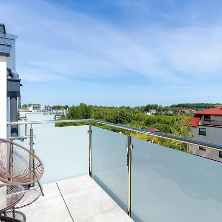Family With A Balcony And Playground In By Renters