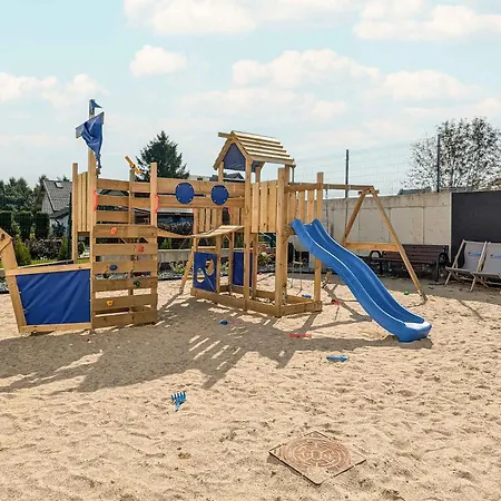 Апартаменты Family With A Balcony And Playground In By Renters